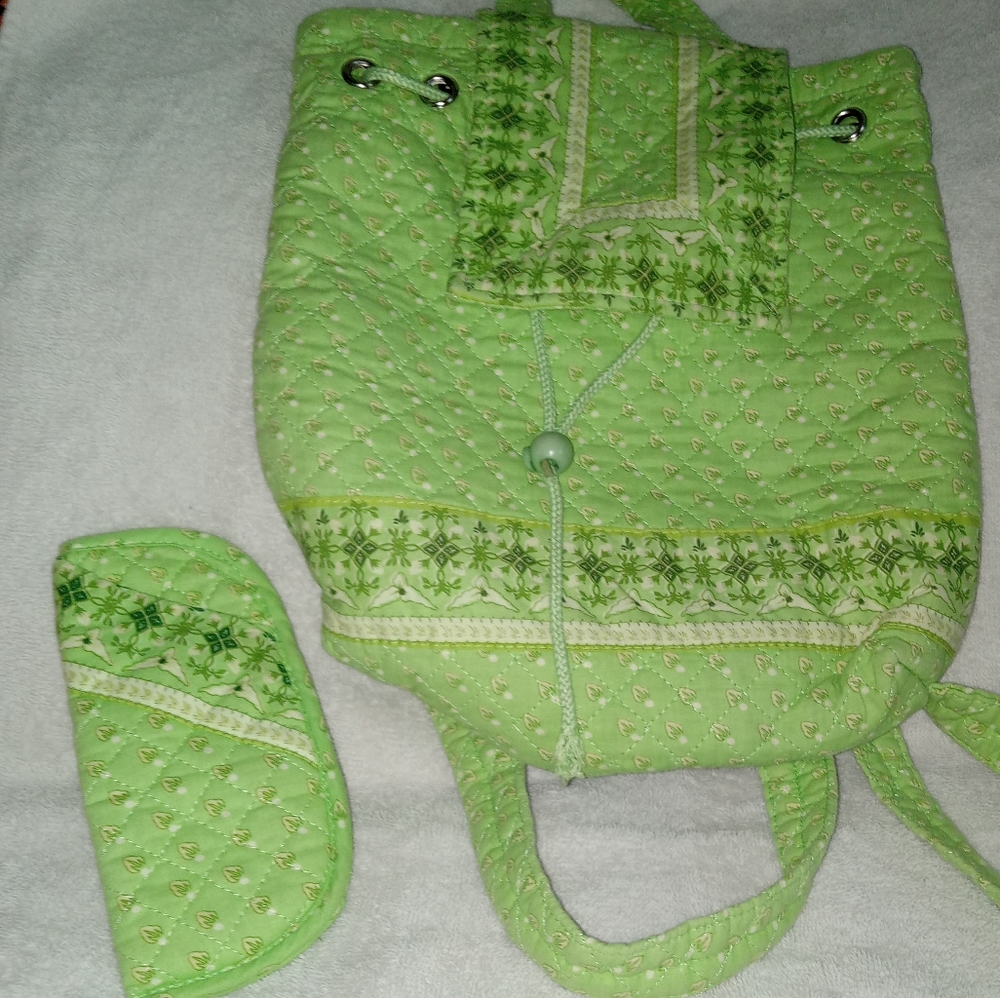Really cute lime green fabric back pack with matching sunglass case